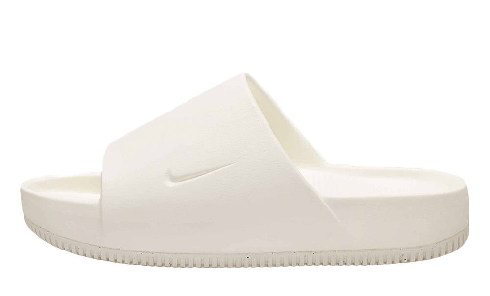 white and teal nike slides