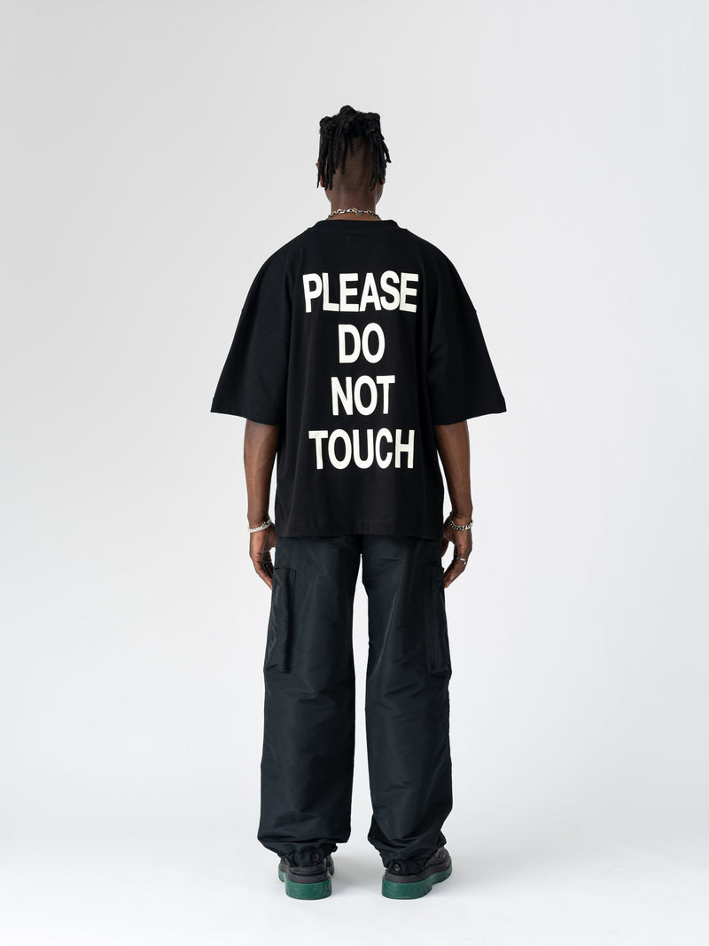 DNS006 'PLEASE DO NOT TOUCH' T-SHIRT IN BLACK